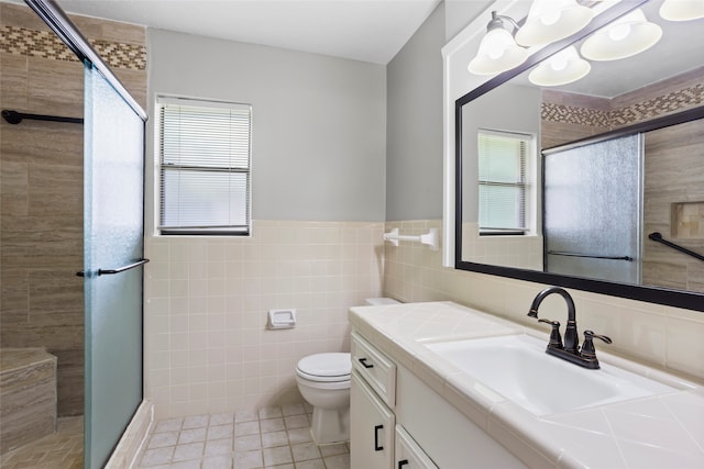 3808 Montego Dr, Baytown, TX 77521 - full bathroom with tile walls, vanity, a shower stall, tile patterned flooring, and a chandelier