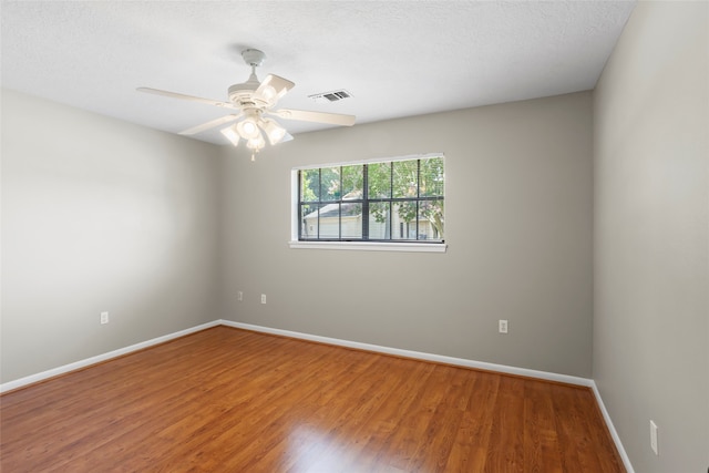 3808 Montego Dr, Baytown, TX 77521 - empty room featuring wood finished floors and a ceiling fan