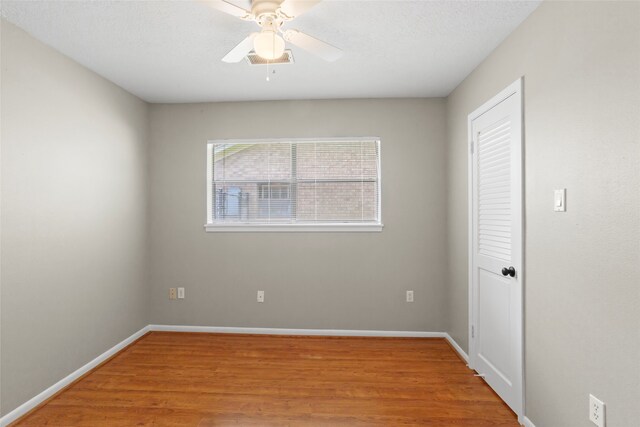 3808 Montego Dr, Baytown, TX 77521 - spare room featuring light wood-type flooring and a ceiling fan