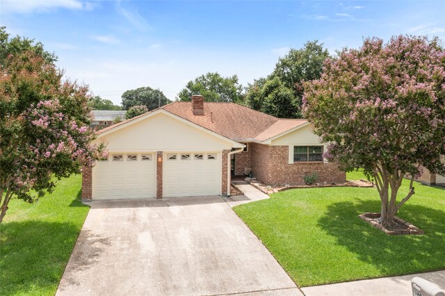 3808 Montego Dr, Baytown, TX 77521 - ranch-style house featuring a garage, brick siding, concrete driveway, and a front yard