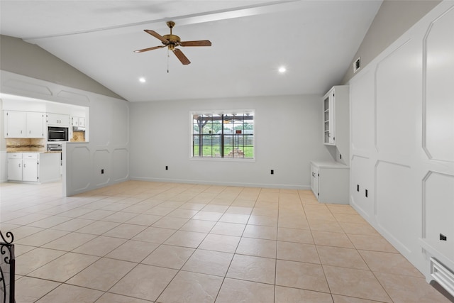 3808 Montego Dr, Baytown, TX 77521 - unfurnished living room featuring a ceiling fan, light tile patterned flooring, vaulted ceiling, and recessed lighting