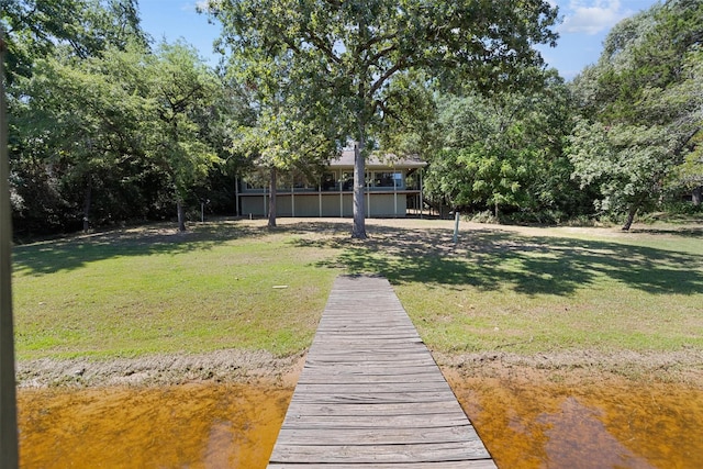 386 Dailey Rd, Crockett, TX 75835 - dock area featuring a yard