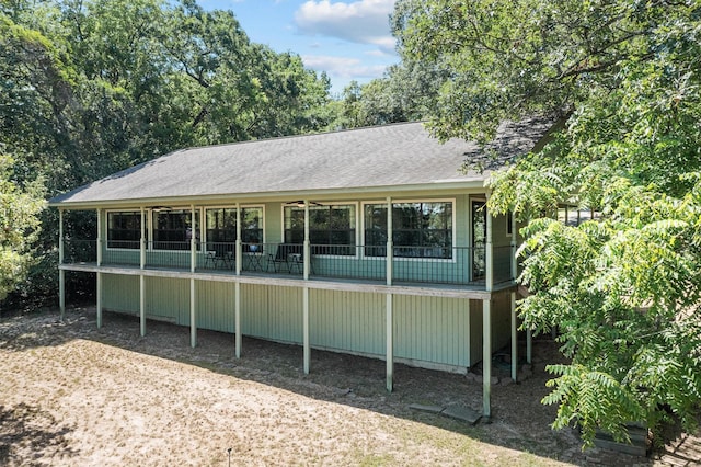 386 Dailey Rd, Crockett, TX 75835 - rear view of house with roof with shingles