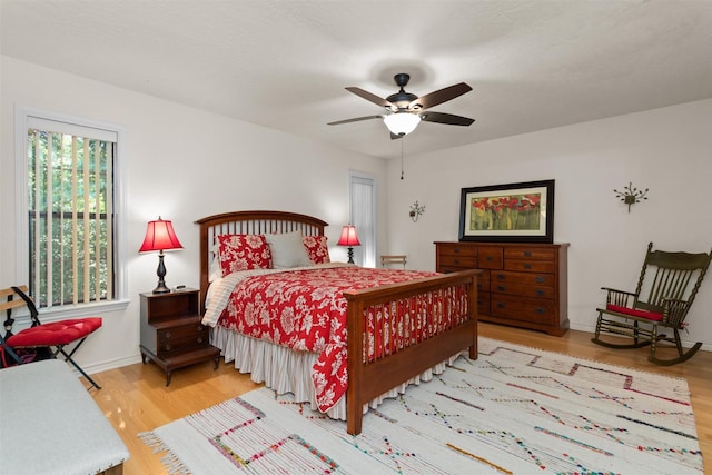 386 Dailey Rd, Crockett, TX 75835 - bedroom with wood finished floors and ceiling fan