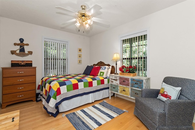 386 Dailey Rd, Crockett, TX 75835 - bedroom featuring wood finished floors and a ceiling fan