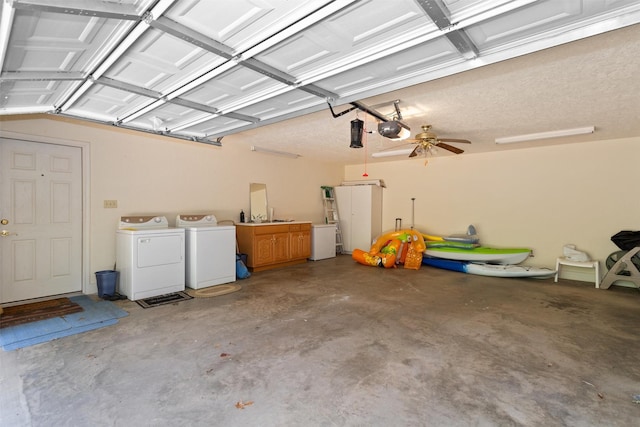 386 Dailey Rd, Crockett, TX 75835 - garage featuring separate washer and dryer, a garage door opener, and a ceiling fan