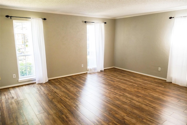 6410 Del Monte Dr Unit 118, Houston, TX 77057 - unfurnished room with crown molding, dark wood-style floors, and a textured ceiling