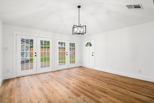 9030 Tanager St, Houston, TX 77036 - unfurnished sunroom with french doors, a chandelier, and lofted ceiling
