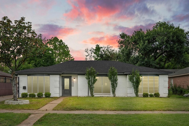 9030 Tanager St, Houston, TX 77036 - single story home with a yard and brick siding