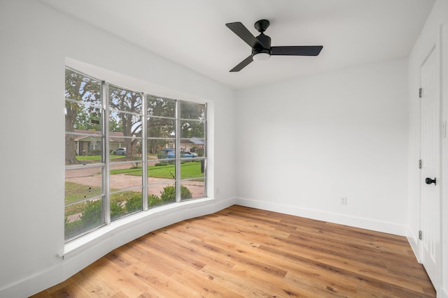 9030 Tanager St, Houston, TX 77036 - empty room featuring wood finished floors and ceiling fan