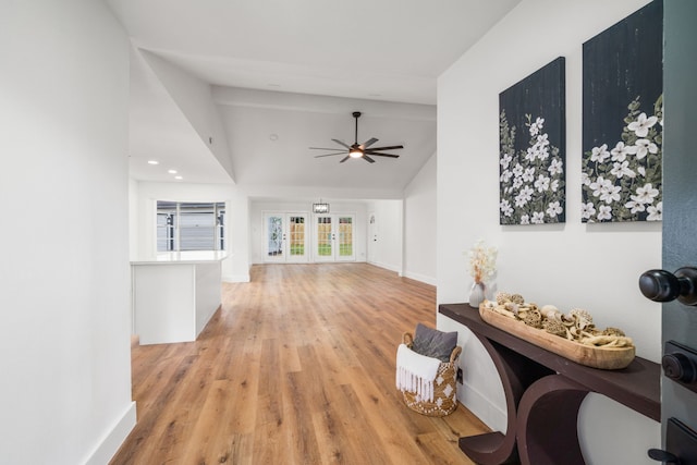 9030 Tanager St, Houston, TX 77036 - hall featuring lofted ceiling and wood finished floors