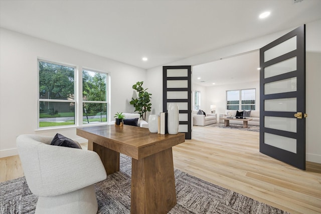 5005 Chestnut St, Bellaire, TX 77401 - home office featuring light wood-type flooring and recessed lighting