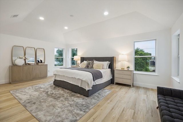 5005 Chestnut St, Bellaire, TX 77401 - bedroom with lofted ceiling, light wood-style floors, and recessed lighting