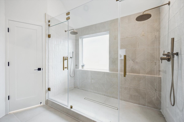 5005 Chestnut St, Bellaire, TX 77401 - bathroom with a shower stall and tile patterned floors