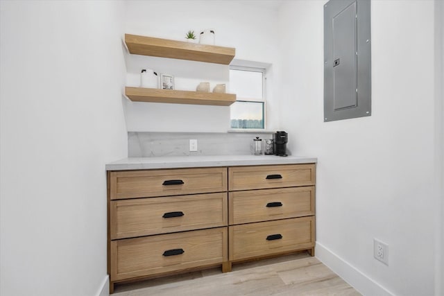 5005 Chestnut St, Bellaire, TX 77401 - detailed view of electric panel and wood finished floors