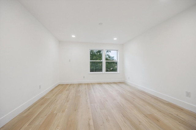 5005 Chestnut St, Bellaire, TX 77401 - unfurnished room featuring light wood-type flooring and recessed lighting