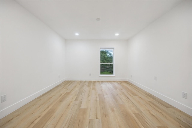 5005 Chestnut St, Bellaire, TX 77401 - spare room featuring light wood-style floors and recessed lighting