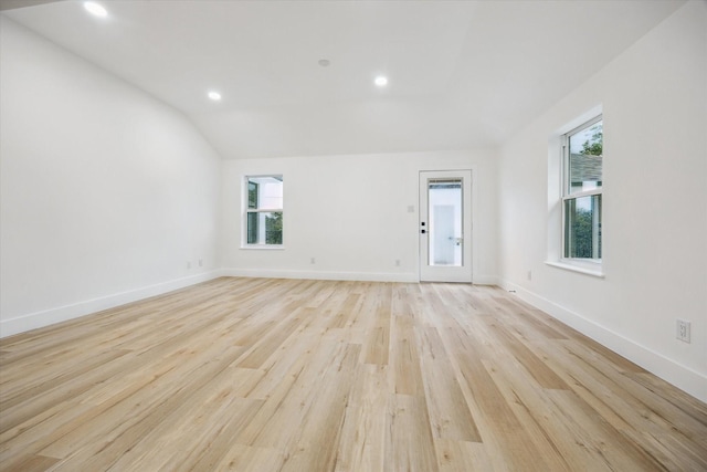 5005 Chestnut St, Bellaire, TX 77401 - unfurnished room with plenty of natural light, light wood finished floors, lofted ceiling, and recessed lighting