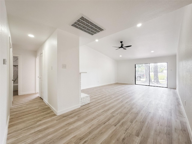 14214 Morinscott, Houston, TX 77049 - spare room with light wood-style floors, a ceiling fan, recessed lighting, and lofted ceiling