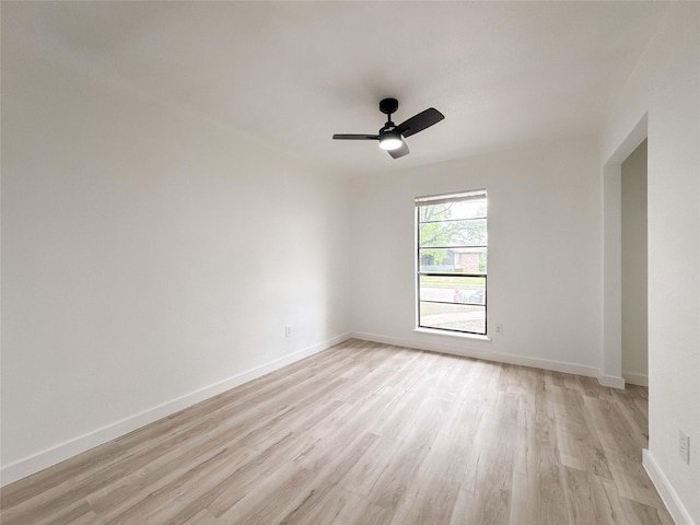 14214 Morinscott, Houston, TX 77049 - spare room featuring light wood-style flooring and a ceiling fan