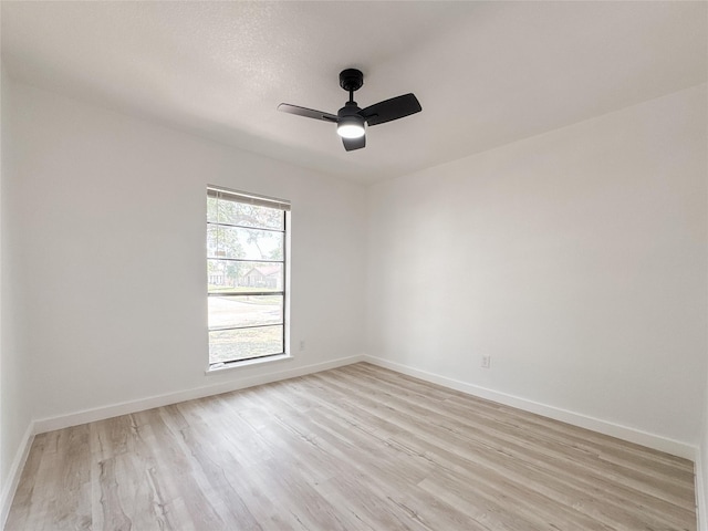 14214 Morinscott, Houston, TX 77049 - spare room featuring light wood-style floors and a ceiling fan
