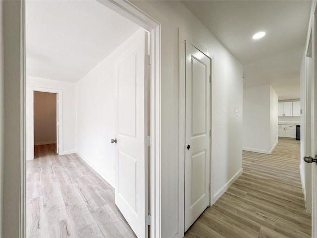 14214 Morinscott, Houston, TX 77049 - hallway featuring light wood-style flooring