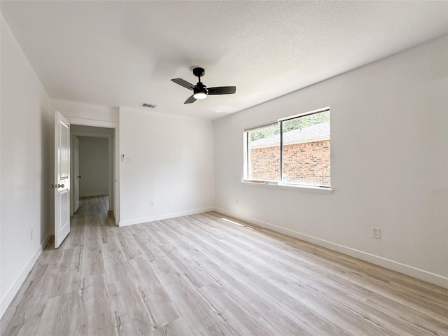 14214 Morinscott, Houston, TX 77049 - unfurnished room featuring light wood-type flooring and a ceiling fan
