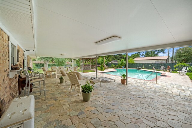 8105 Miller Dr, Hitchcock, TX 77563 - view of pool featuring a fenced backyard, a patio area, and outdoor lounge area