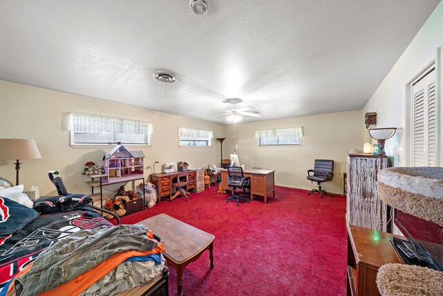 8105 Miller Dr, Hitchcock, TX 77563 - carpeted bedroom featuring a desk and a ceiling fan