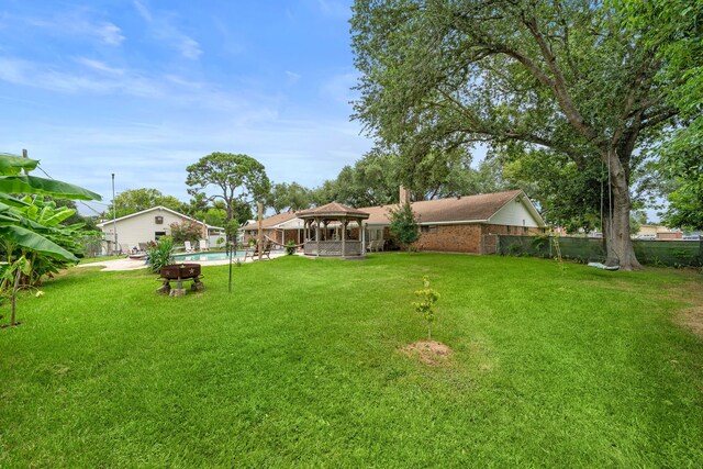 8105 Miller Dr, Hitchcock, TX 77563 - view of yard featuring a gazebo