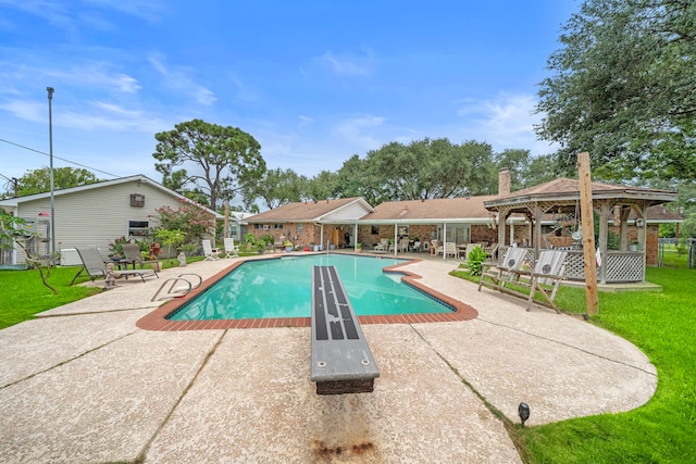8105 Miller Dr, Hitchcock, TX 77563 - swimming pool with a gazebo, a patio area, and a yard
