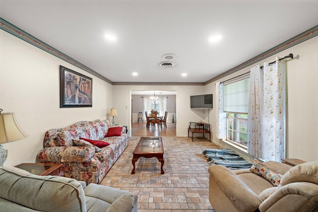8105 Miller Dr, Hitchcock, TX 77563 - living area with ornamental molding, a chandelier, and recessed lighting