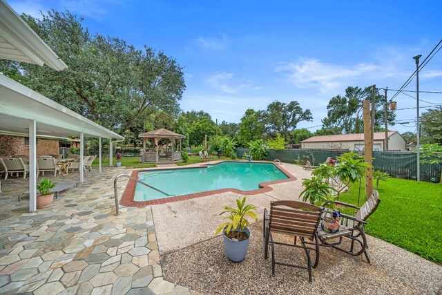 8105 Miller Dr, Hitchcock, TX 77563 - view of pool featuring a gazebo, a patio, and a fenced backyard