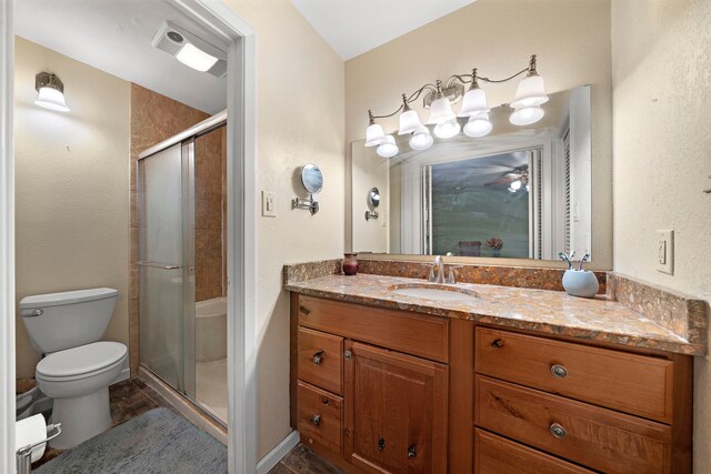8105 Miller Dr, Hitchcock, TX 77563 - bathroom featuring vanity, a shower stall, and a ceiling fan