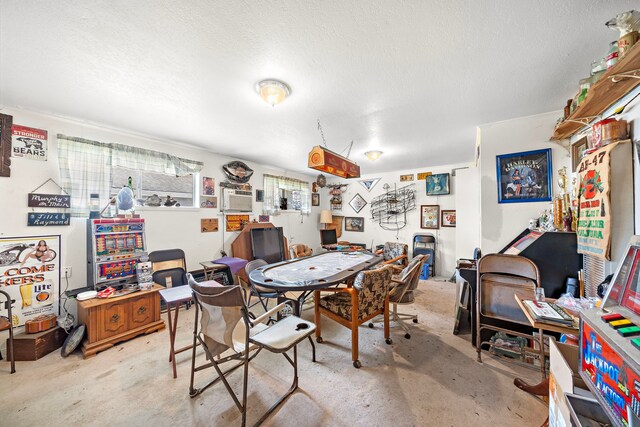 8105 Miller Dr, Hitchcock, TX 77563 - dining area with concrete floors and a textured ceiling