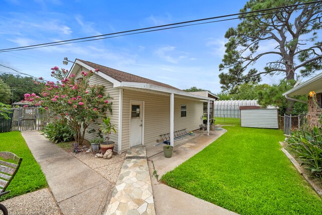 8105 Miller Dr, Hitchcock, TX 77563 - view of front facade with a fenced backyard and a gate
