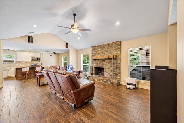 2546 Anzalone Dr, Spring, TX 77373 - living area with ceiling fan, vaulted ceiling, dark wood-style floors, healthy amount of natural light, and recessed lighting
