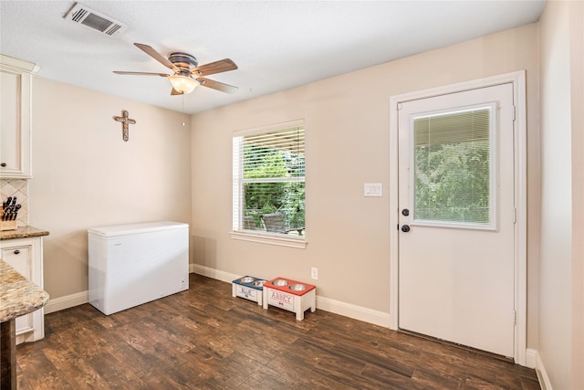 2546 Anzalone Dr, Spring, TX 77373 - laundry room featuring a ceiling fan and dark wood finished floors