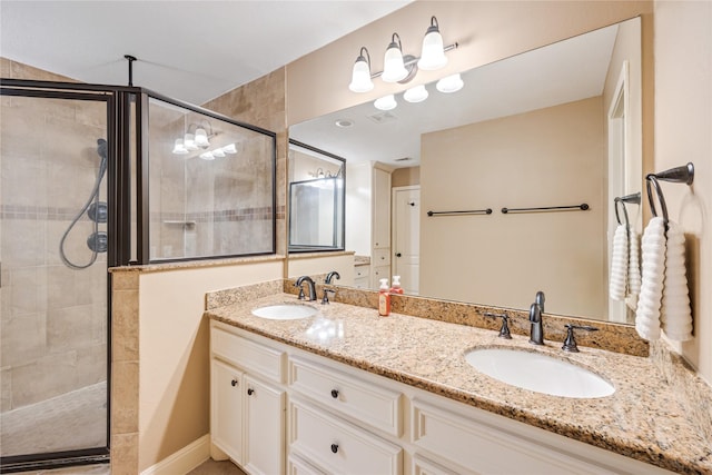 2546 Anzalone Dr, Spring, TX 77373 - bathroom with a stall shower and double vanity