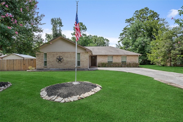 2546 Anzalone Dr, Spring, TX 77373 - ranch-style home with brick siding and driveway