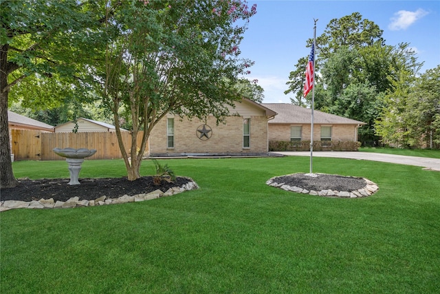 2546 Anzalone Dr, Spring, TX 77373 - view of front facade featuring brick siding