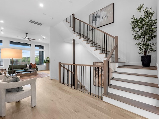 5240 Cornish Unit B, Houston, TX 77007 - stairway featuring recessed lighting, wood finished floors, and a ceiling fan