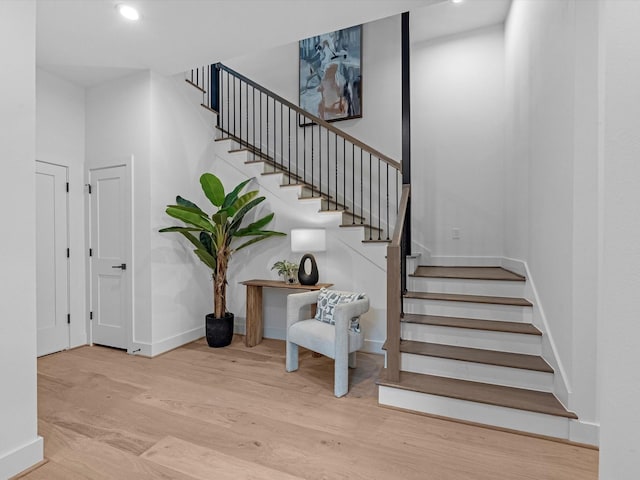 5240 Cornish Unit B, Houston, TX 77007 - staircase featuring wood finished floors and recessed lighting