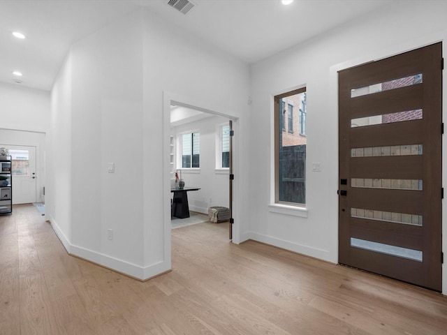 5240 Cornish Unit B, Houston, TX 77007 - entryway with light wood-style floors and recessed lighting
