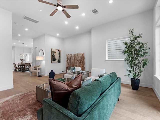 5240 Cornish Unit B, Houston, TX 77007 - living area with light wood finished floors, a ceiling fan, and recessed lighting