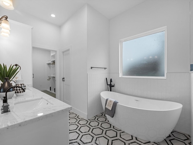 5240 Cornish Unit B, Houston, TX 77007 - full bathroom with wainscoting, double vanity, and a freestanding tub
