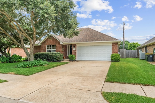 5207 Caprock Dr, Pearland, TX 77584 - view of front of property featuring brick siding, an attached garage, concrete driveway, and a shingled roof