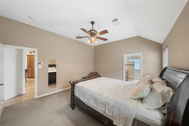 5207 Caprock Dr, Pearland, TX 77584 - carpeted bedroom featuring vaulted ceiling, ceiling fan, and ensuite bath