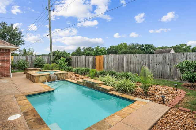 5207 Caprock Dr, Pearland, TX 77584 - view of swimming pool with a fenced backyard, a patio, and a pool with connected hot tub