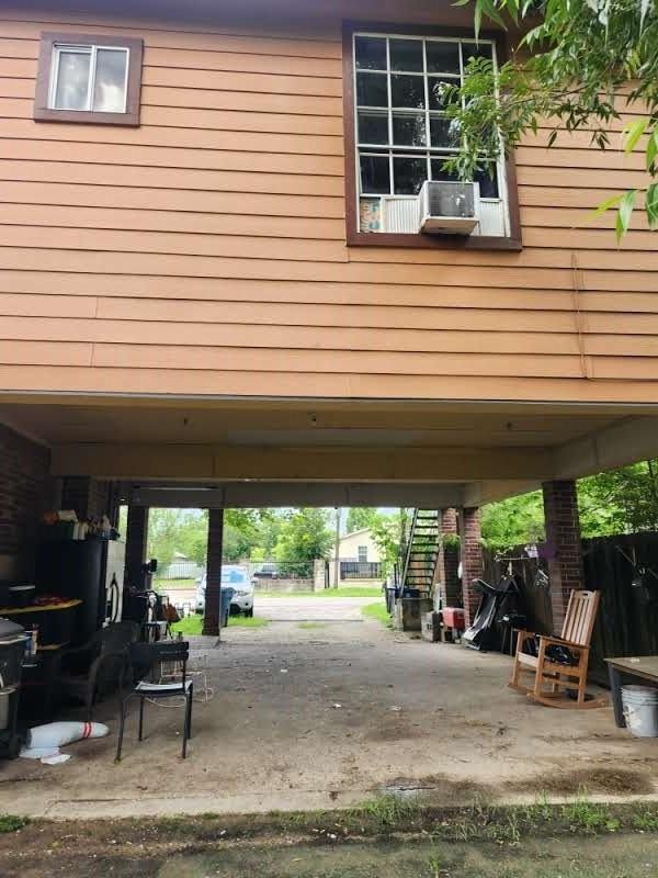 1902 July St, Houston, TX 77093 - garage with a carport